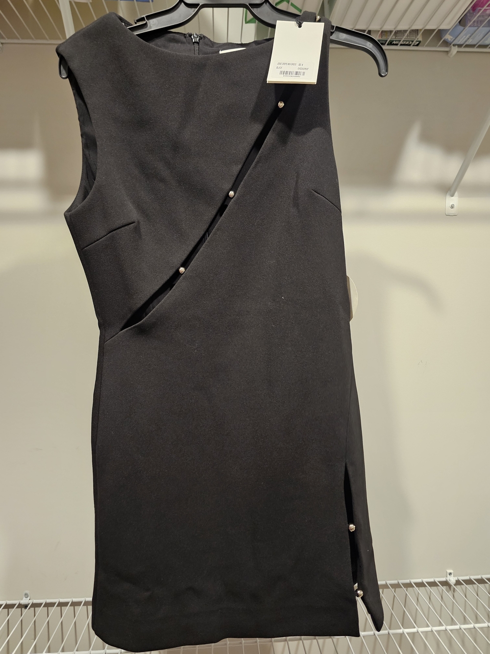 Sleeveless Black Mini Dress with Diagonal Button Trim